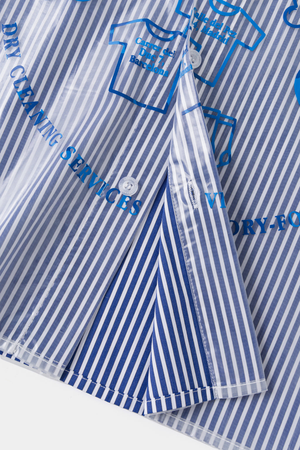 Detail of the hem, where the cover and the striped shirt are stitched as one.