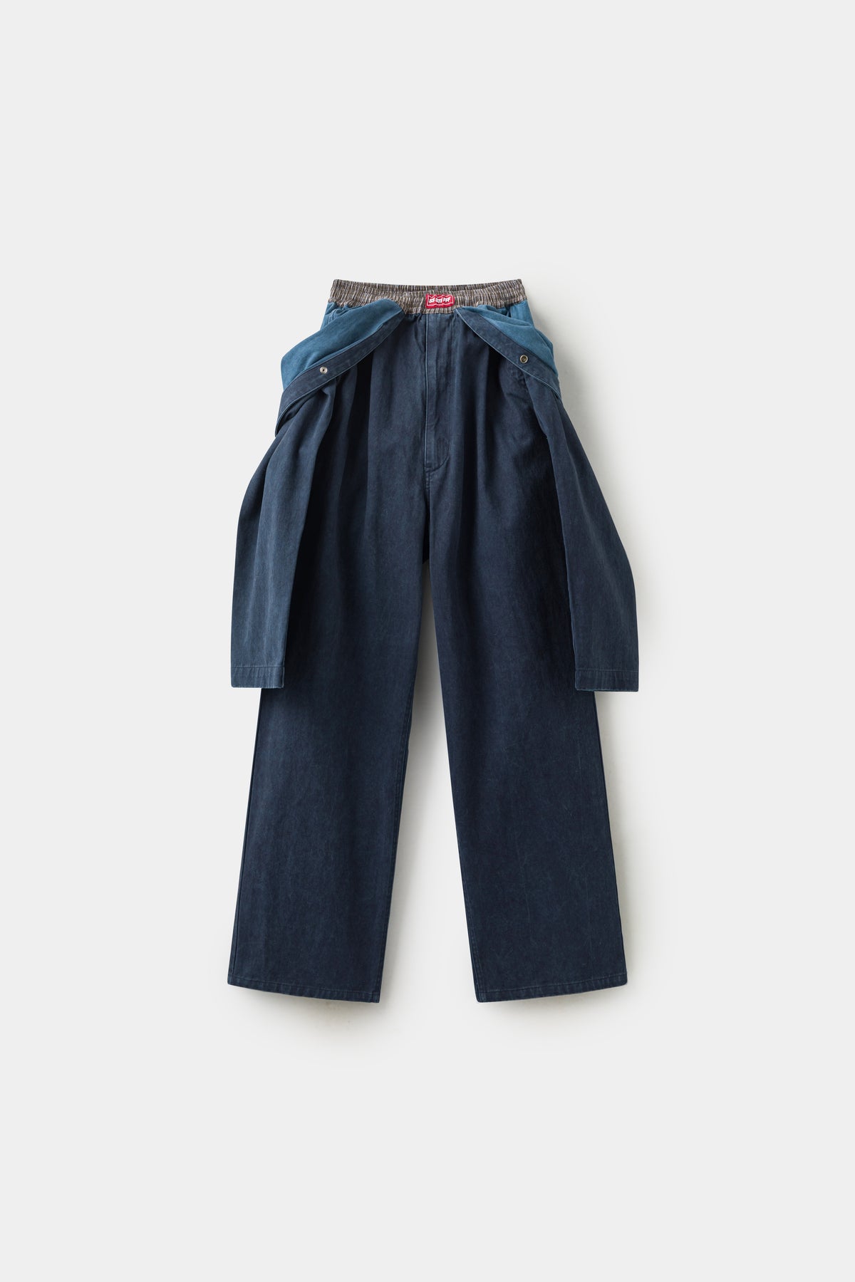 Fake Overall Pants in dark washed denim, a wide-leg pant with an overall bib and straps spliced into the waist as if tied down.