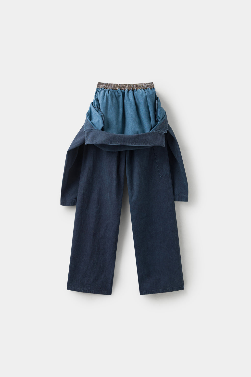 Back view of the Fake Overall Pants, with the bib hanging down over the elasticated striped waistband.