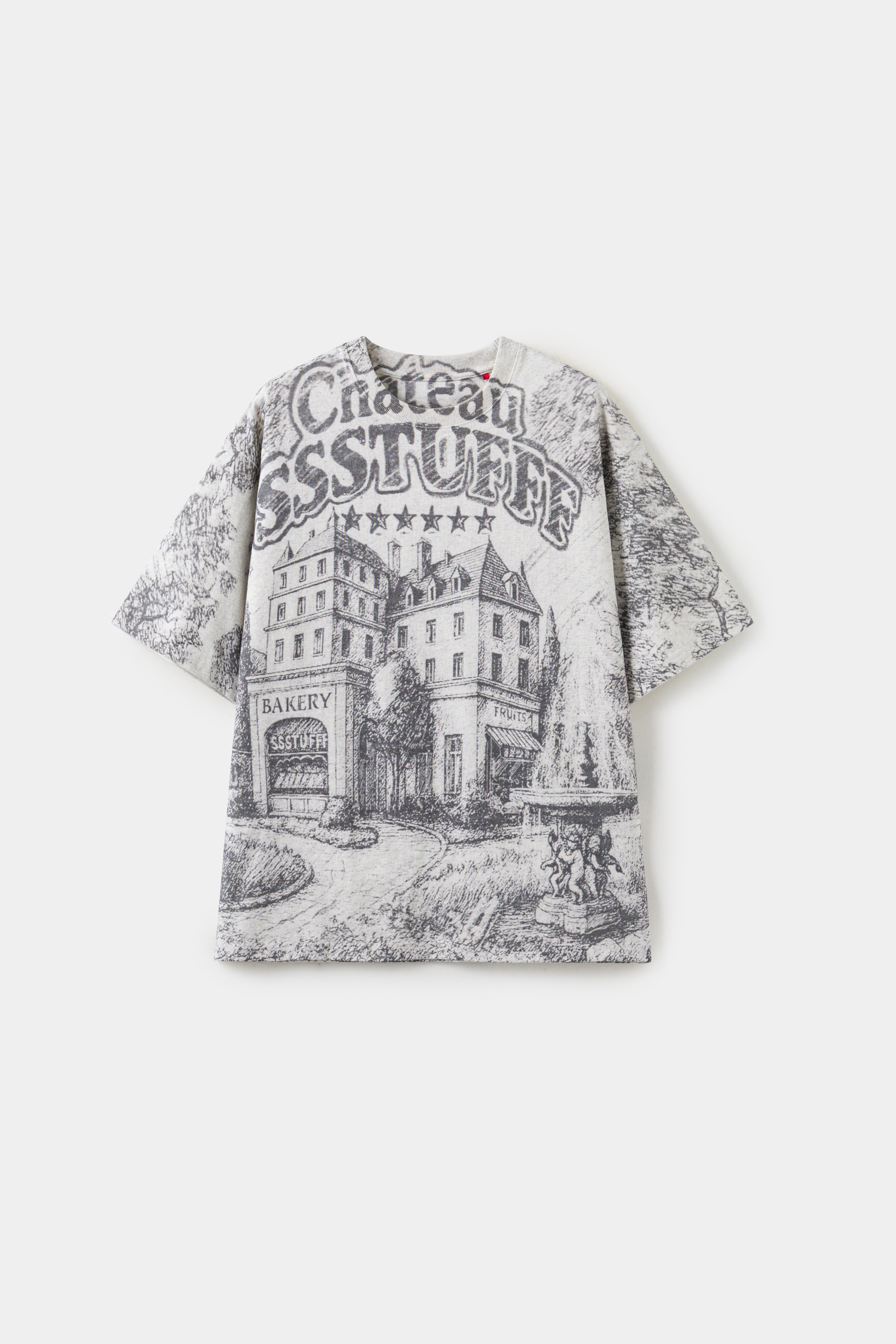 AOP Print Postcard Tee in off-white, printed edge to edge with the Château SSSTUFFF hotel postcard artwork.