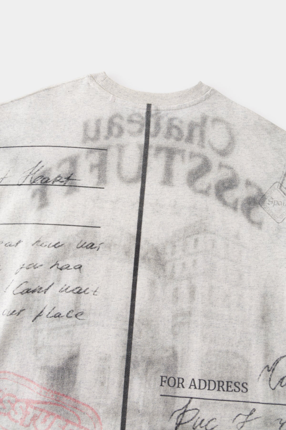 Close-up of the back print: the postcard dividing line, handwritten message and FOR ADDRESS field.