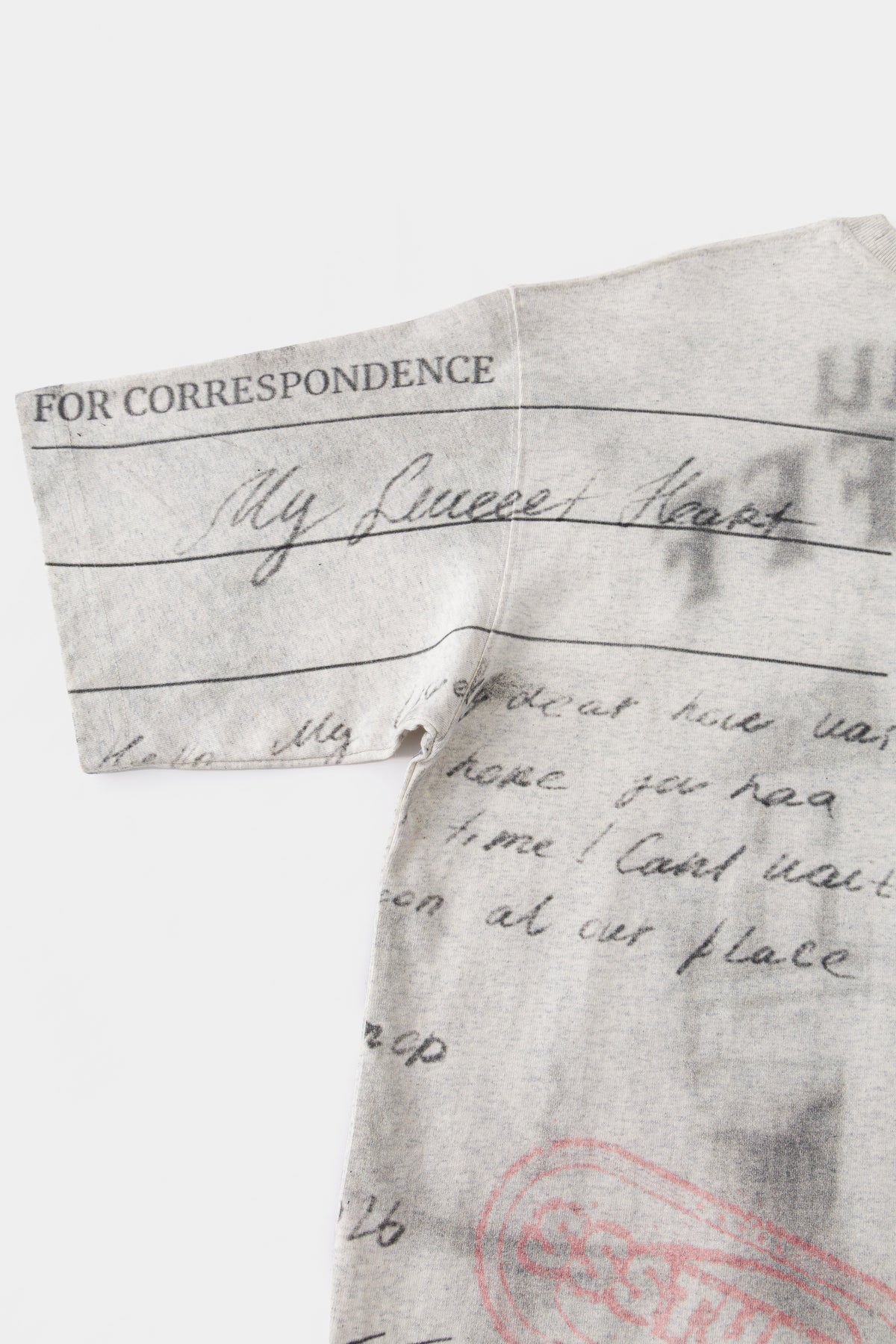 Detail of the FOR CORRESPONDENCE lines and handwritten note printed across the back and sleeve.