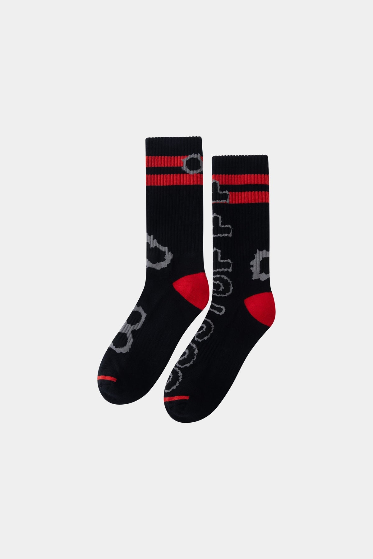Gunshots Socks in black, the pair side by side showing the red stripes and bullet-hole knit.