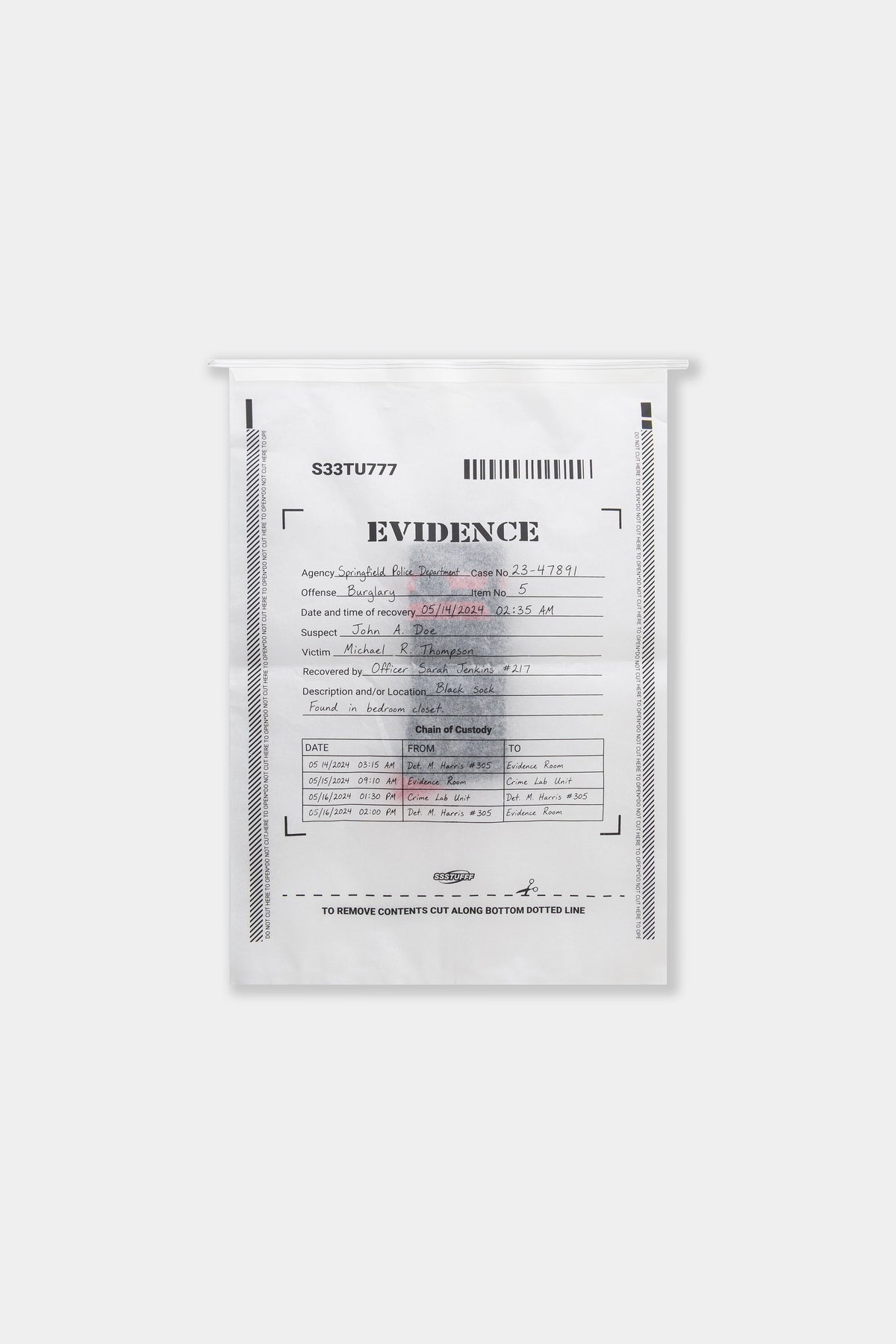 Close-up of the Gunshots Socks EVIDENCE bag packaging with its chain-of-custody form.
