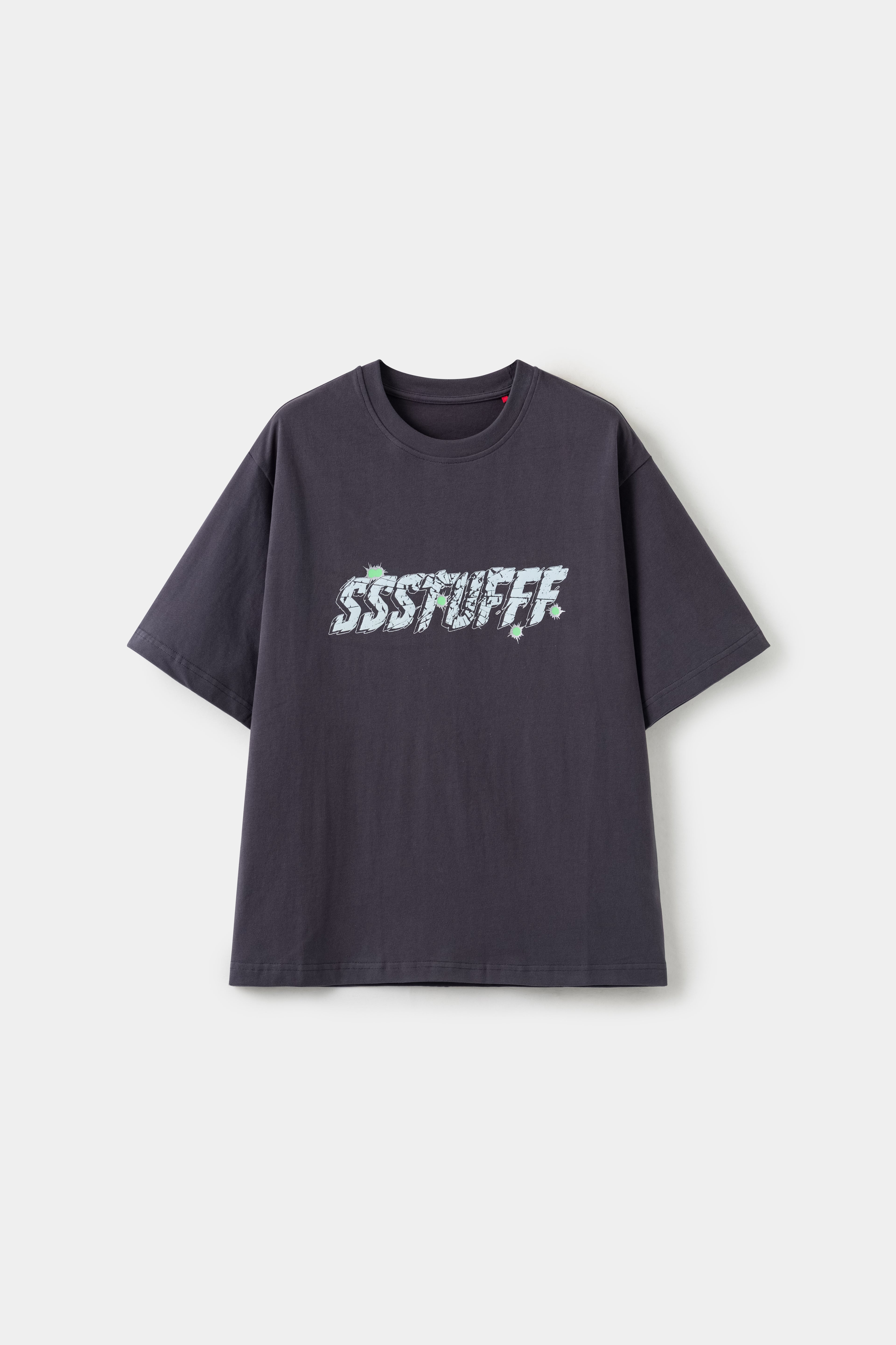 Gunshots Tee in charcoal with the SSSTUFFF logo printed as glass shattered by a bullet.