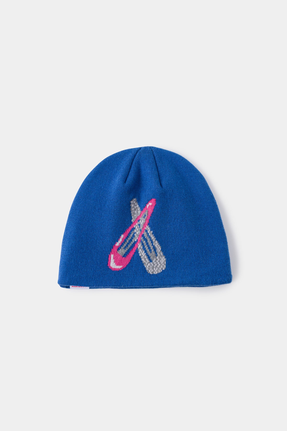 Hairclip Beanie in blue, knitted with an oversized pink and silver hair clip on the front.