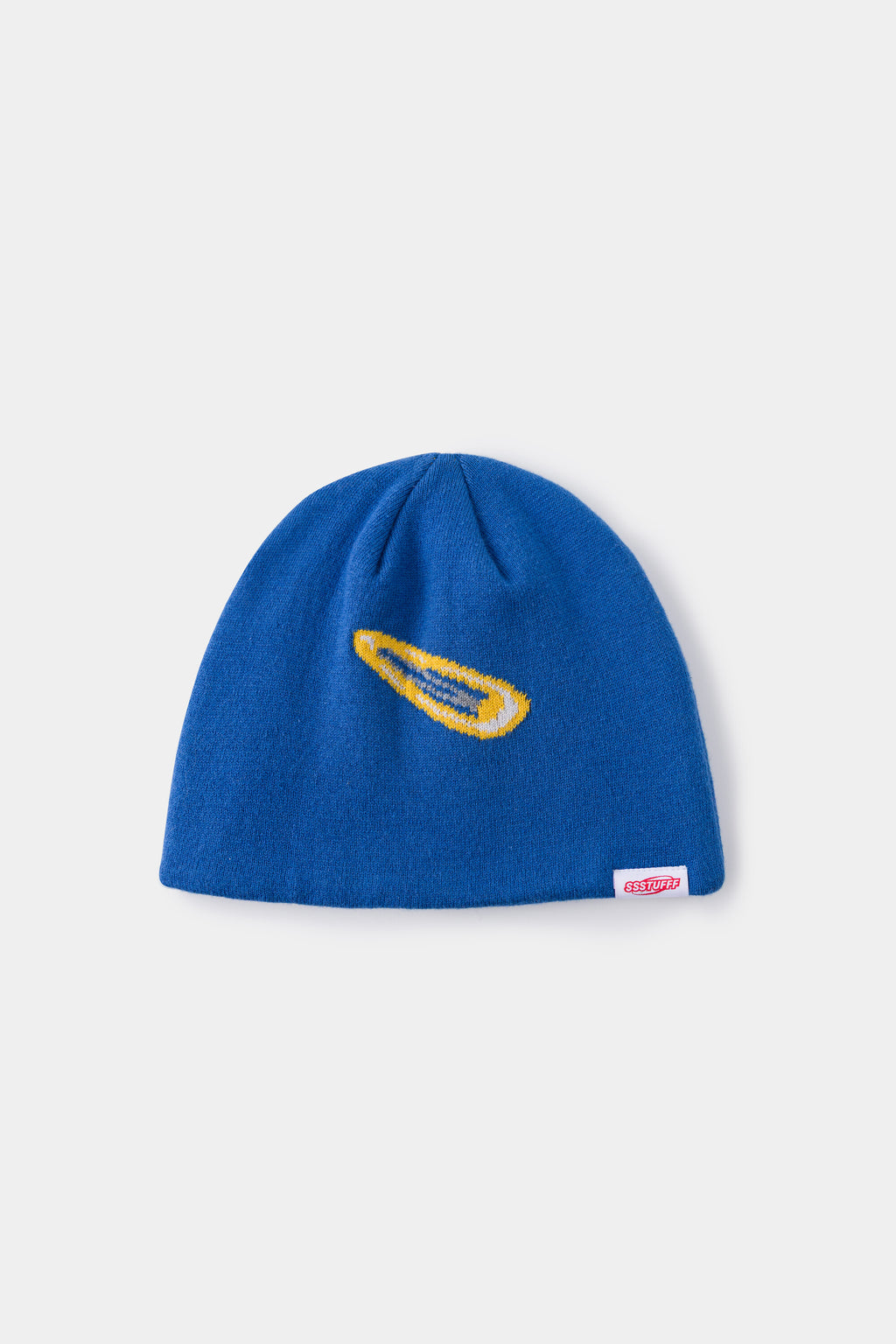 Back view of the blue beanie, with a yellow hair clip and the red Ssstufff label at the hem.