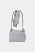 Hoodie Bag in grey marl, a hoodie rebuilt as a crossbody bag with the two sleeves knotted into the strap.