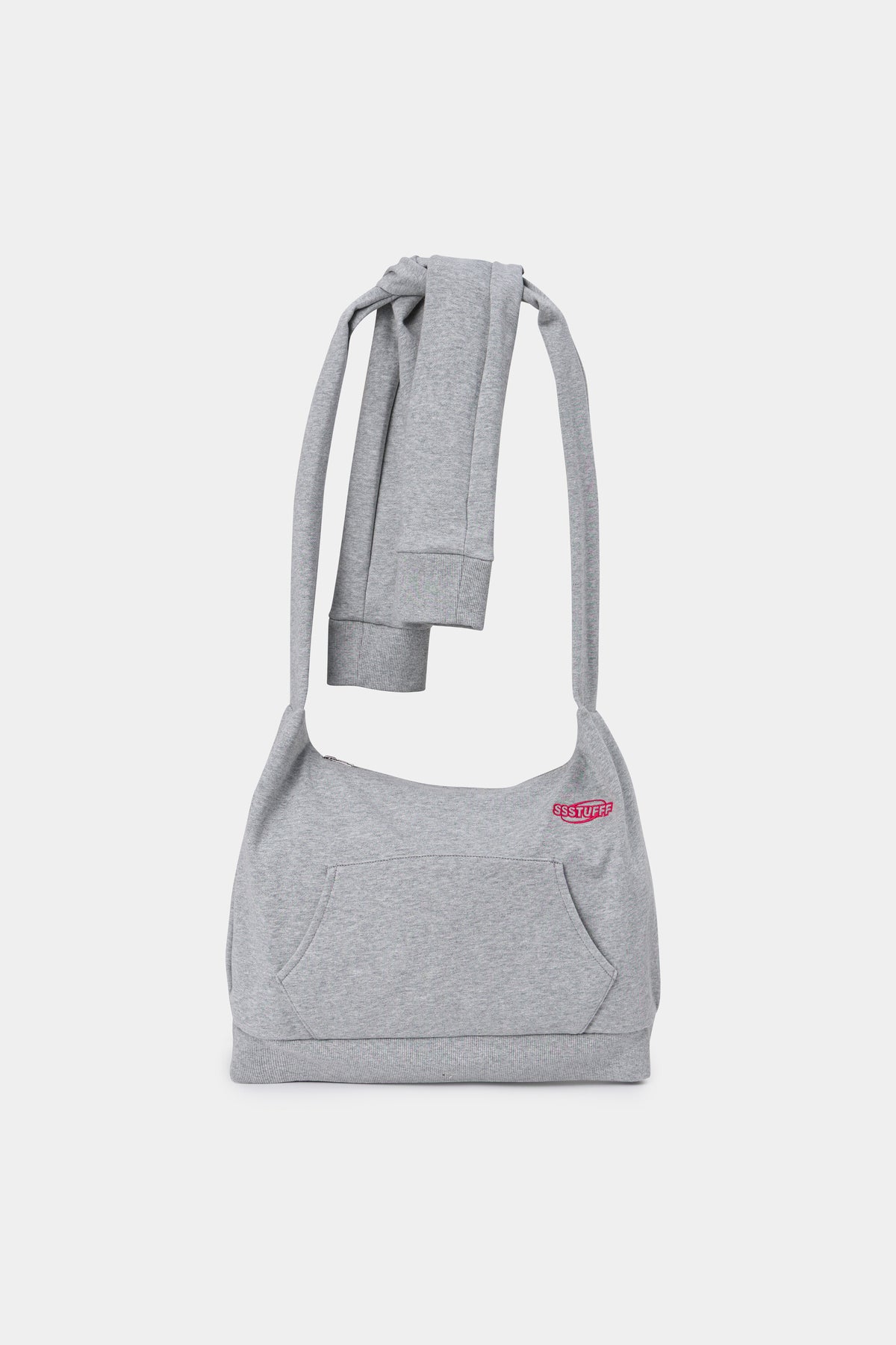 Hoodie Bag in grey marl, a hoodie rebuilt as a crossbody bag with the two sleeves knotted into the strap.