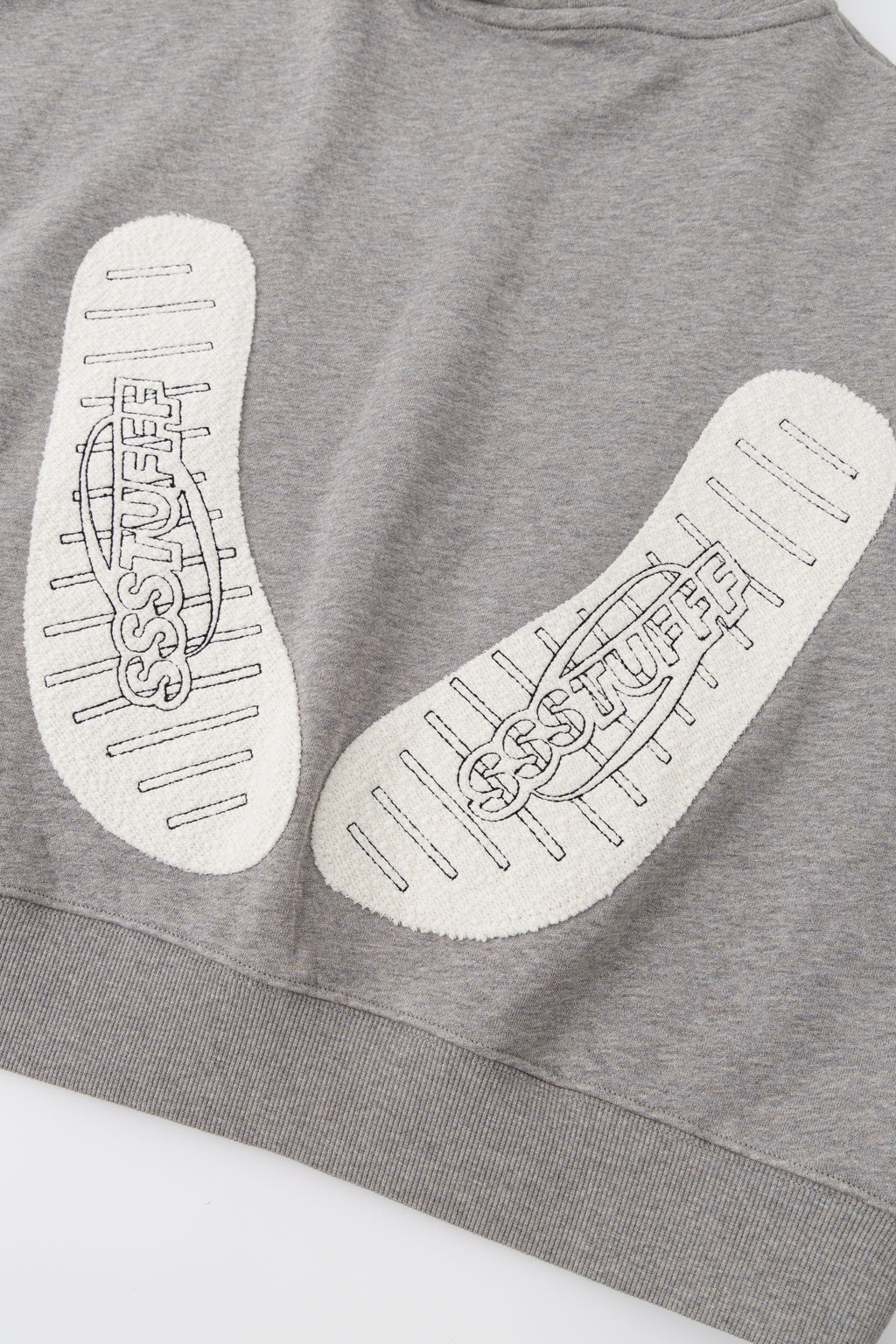 Detail of the printed slipper sole patches at the back.