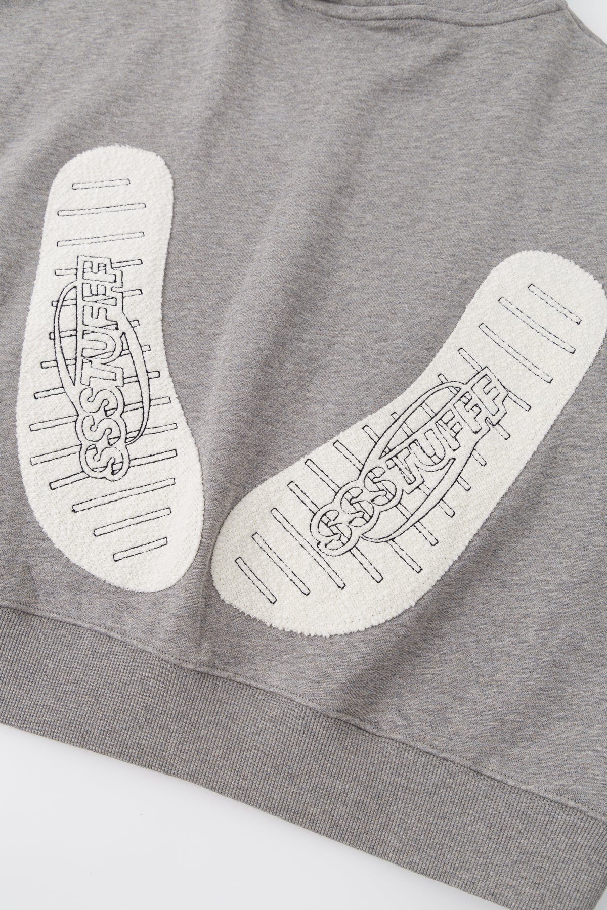 Detail of the printed slipper sole patches at the back.