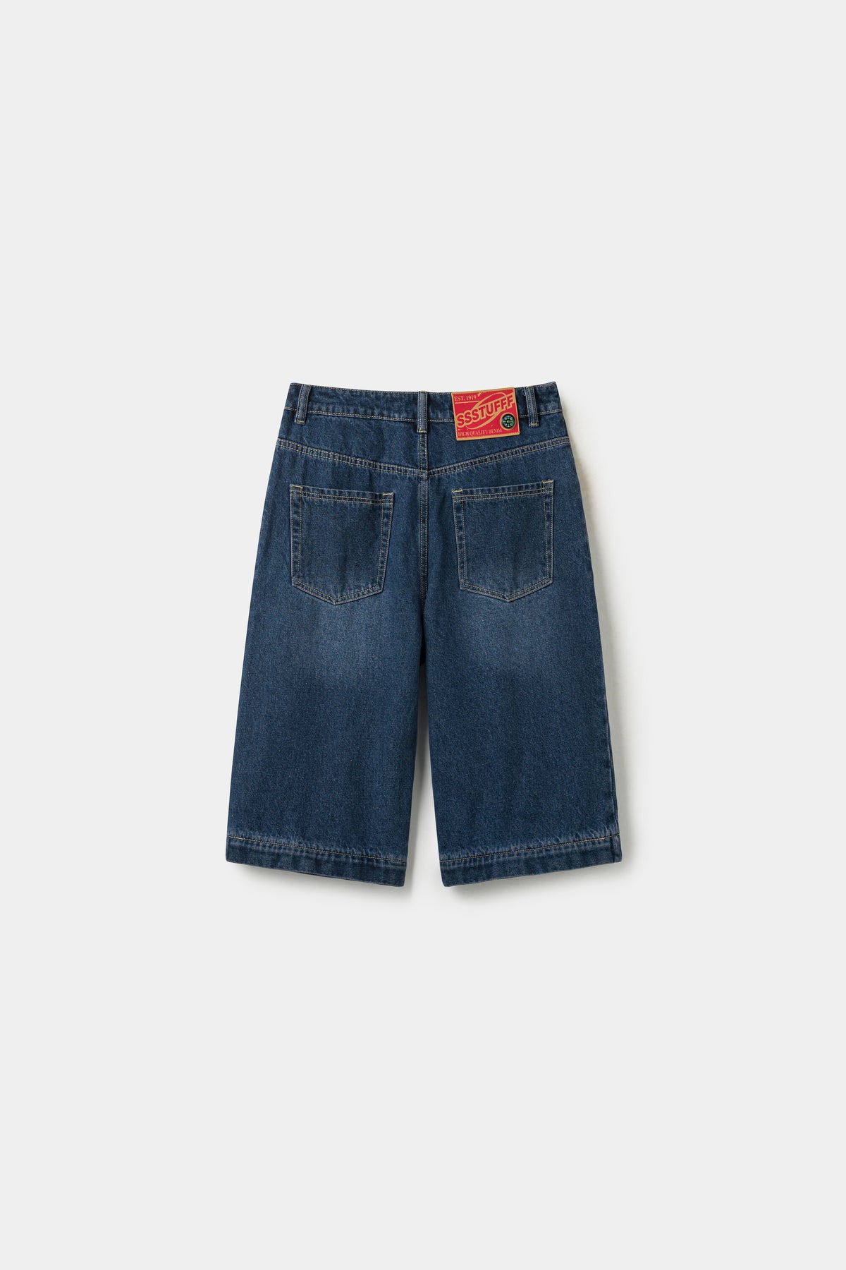 Back view of the denim shorts on their own, with the red SSSTUFFF label at the waistband.