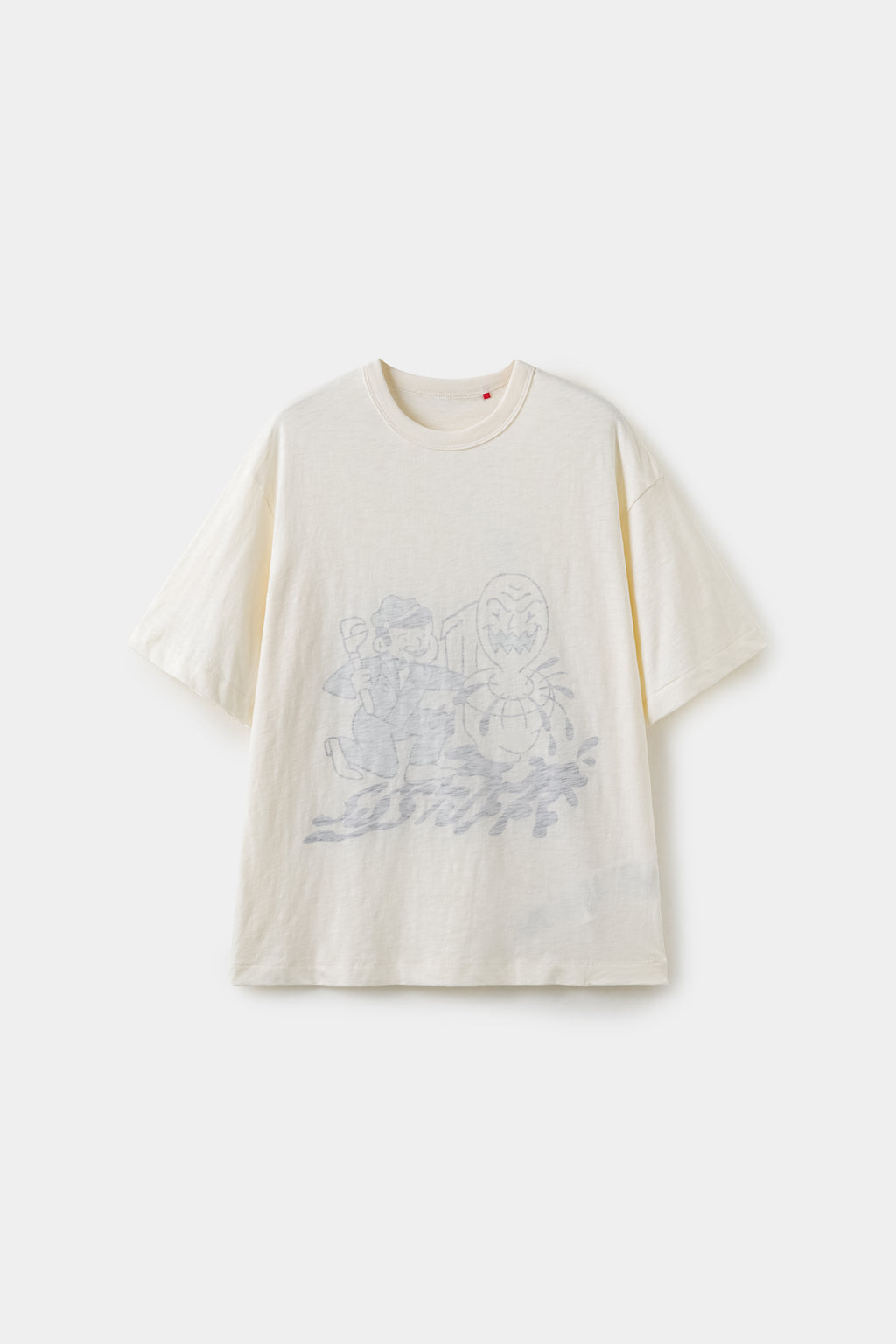 Inside Out Plumber Tee in cream, worn inside out so the plumber graphic shows faintly through the fabric.