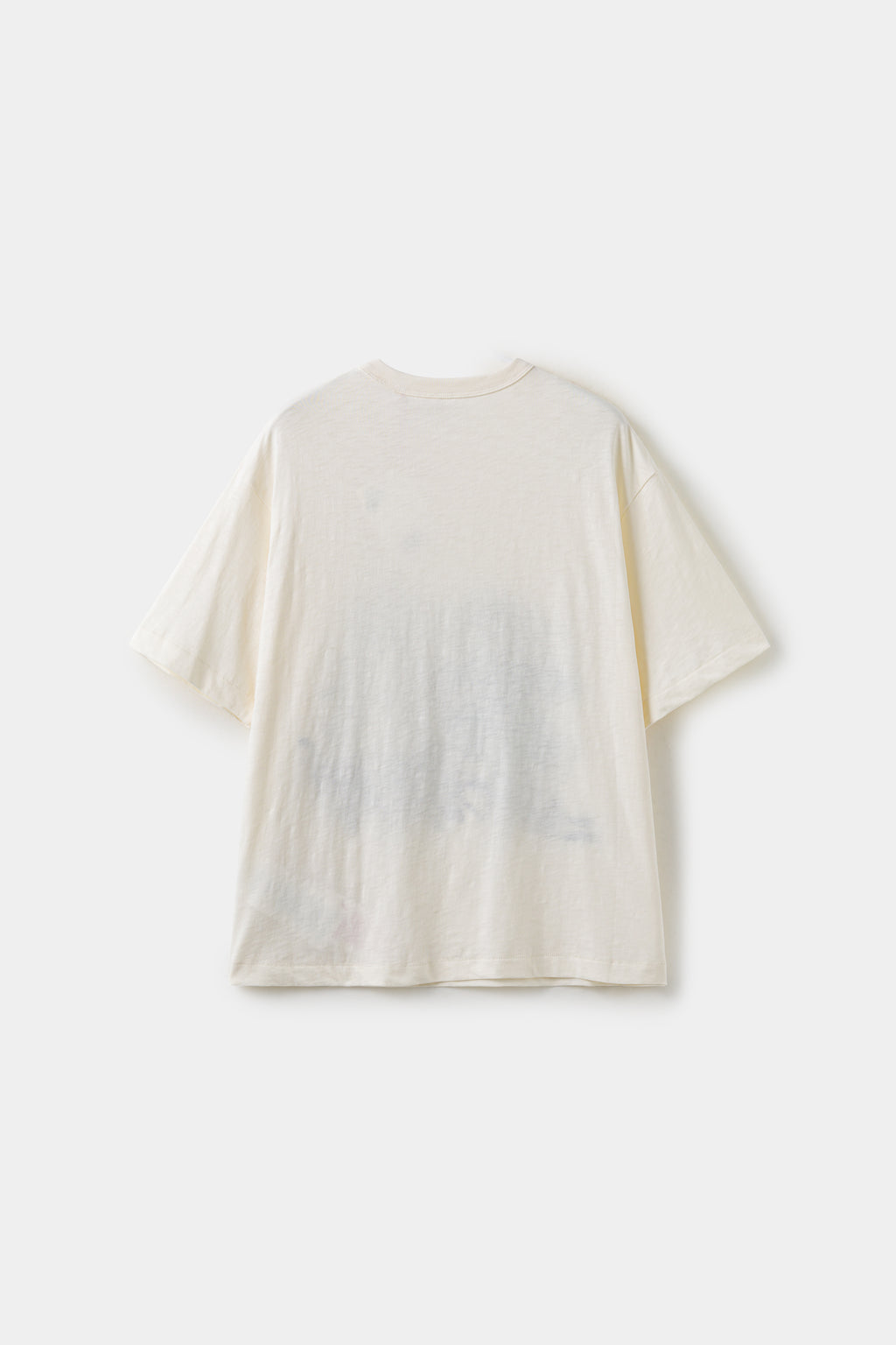 Back view of the cream tee, with the exposed seams and neck binding of the inside-out construction.