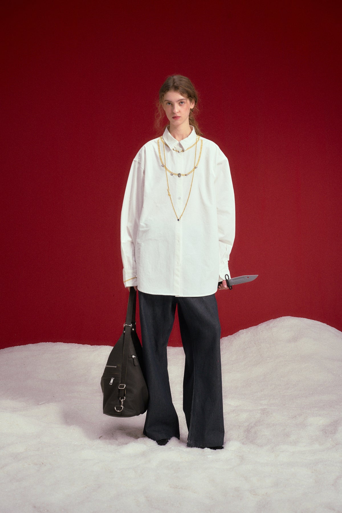 Fancy Embroidery Jewelry Shirt in off-white, embroidered with jewellery chains at the neckline. Worn on a model, full-length front view.