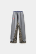 Layered Waffle Camo Pants in grey, worn over a waffle camo layer that shows at the hem.