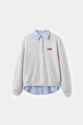 Layered Shirt Crewneck in grey marl, spliced with a blue gingham shirt collar and hem.