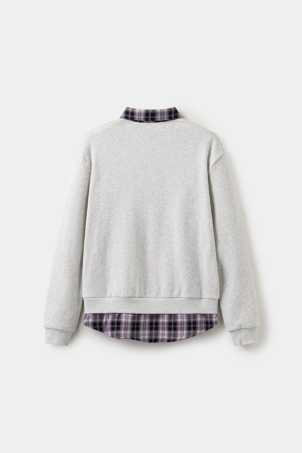 Back view of the oatmeal layered shirt crewneck, with the checked shirt tail at the hem.