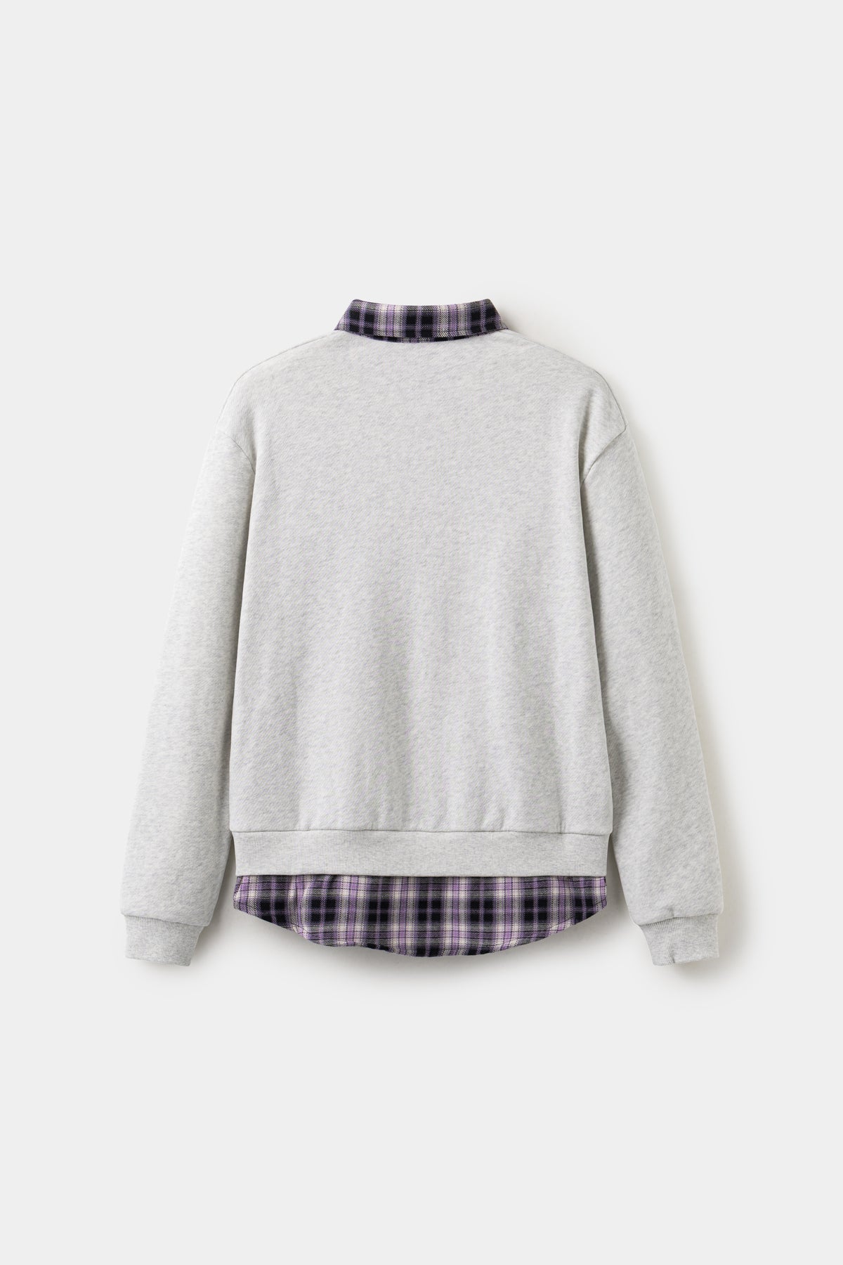 Back view of the oatmeal layered shirt crewneck, with the checked shirt tail at the hem.