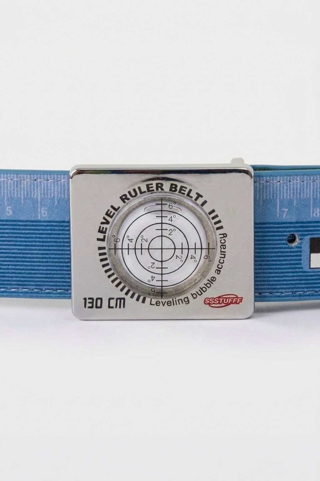 The second interchangeable buckle, identical but with a clear leveling bubble in place of the green one.