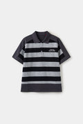 M. Gustave Layered Striped Polo, black and grey prison stripes laid over a solid charcoal polo body, with a Chateau SSSTUFFF chest embroidery.