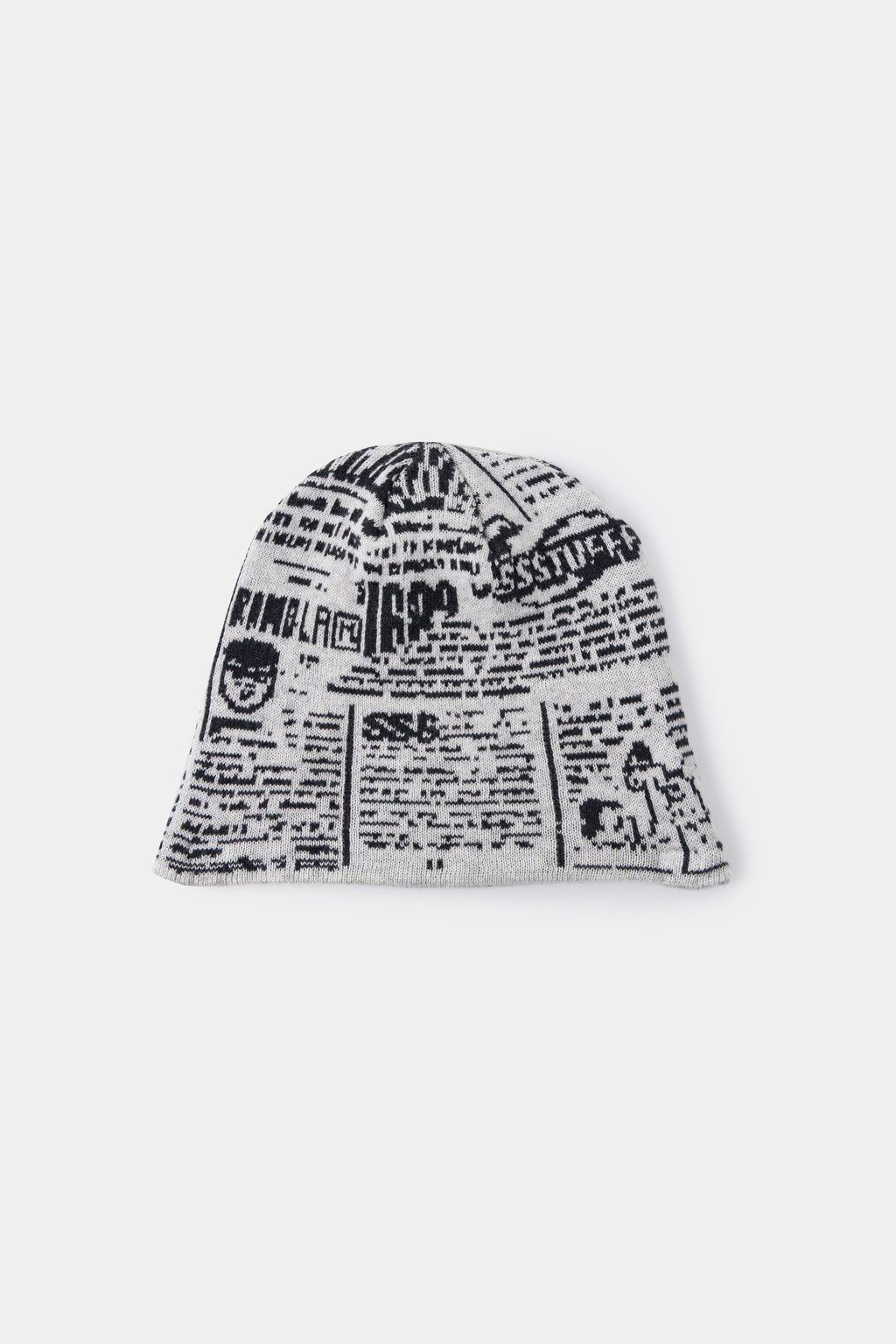 Back view of the newsprint beanie, covered in headlines and a small black cat.
