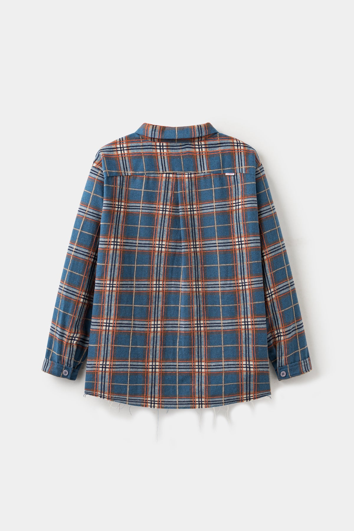 Back view of the blue plaid shirt, with raw threads hanging from the hem.