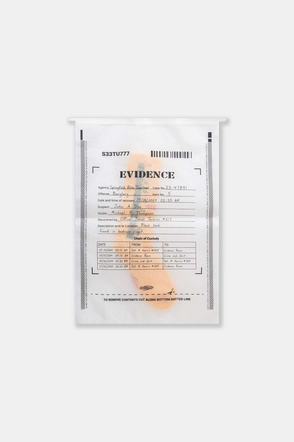 The Ruler Socks packed in their printed EVIDENCE bag.