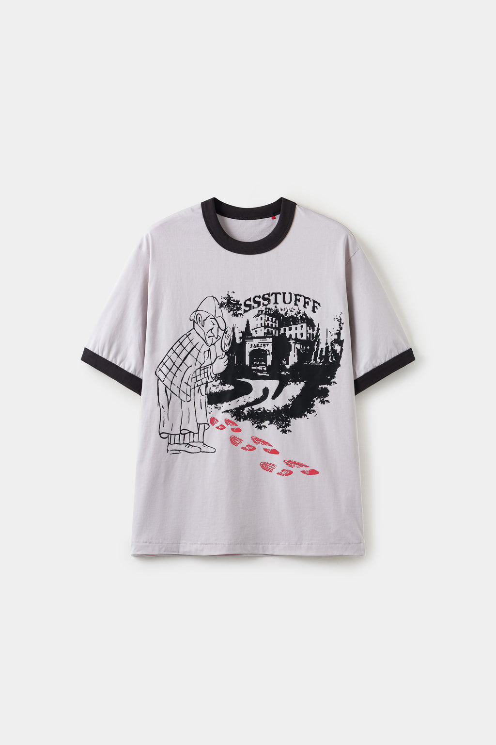The same tee with the footprints turned red after warming, showing the thermochromic reveal.