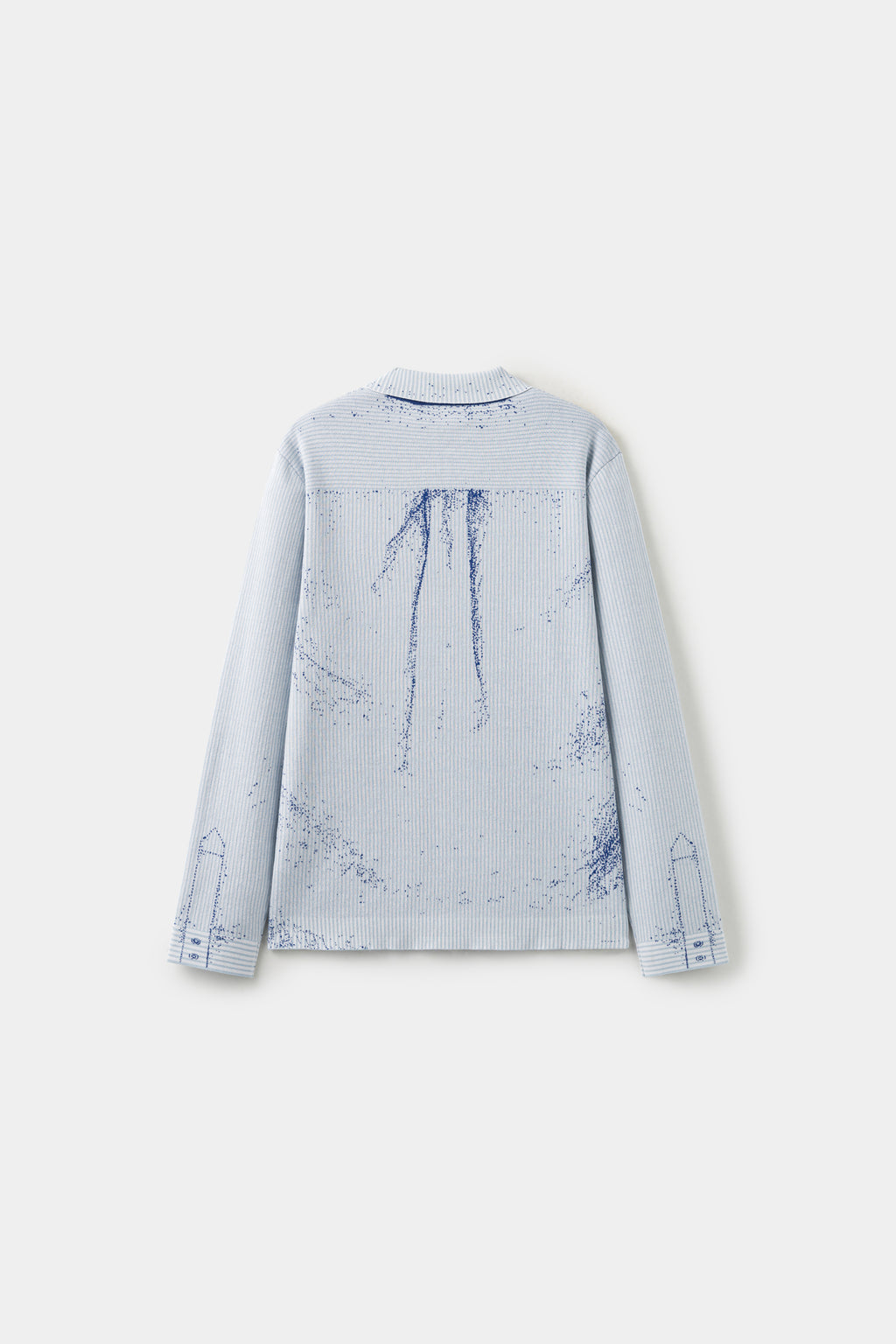 Back view of the pale blue Tie Knit, with the ink splatter continuing across the back.