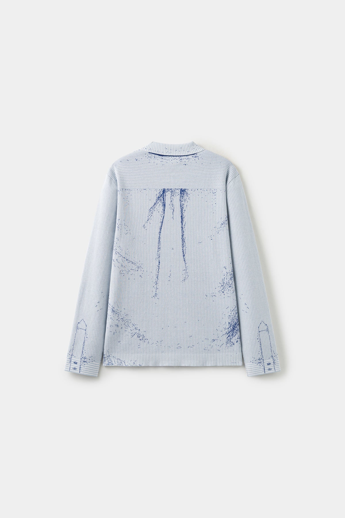 Back view of the pale blue Tie Knit, with the ink splatter continuing across the back.
