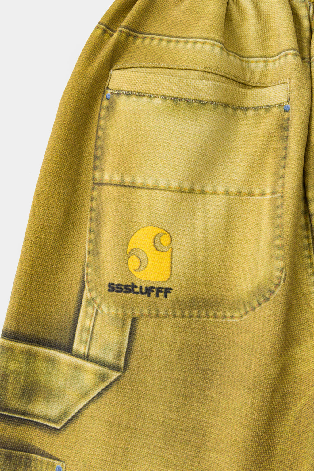 Detail of the printed carpenter pocket with the Ssstufff logo at the side seam.