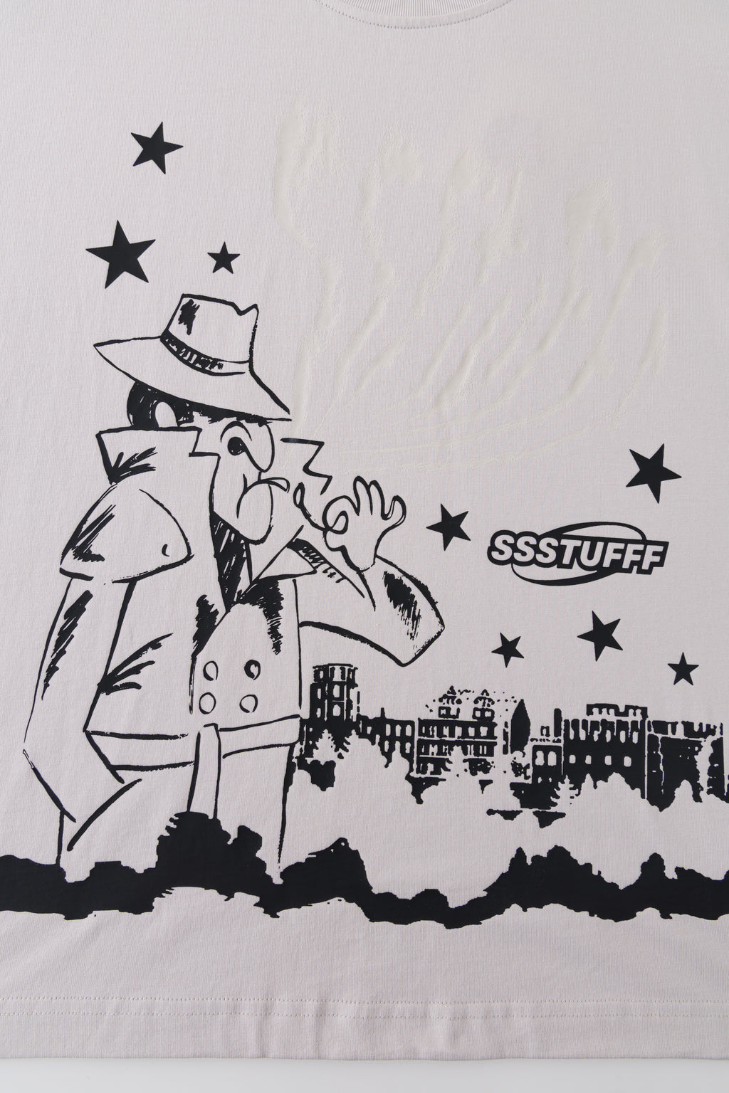 Close-up of the front print before exposure, with clear space above the detective.