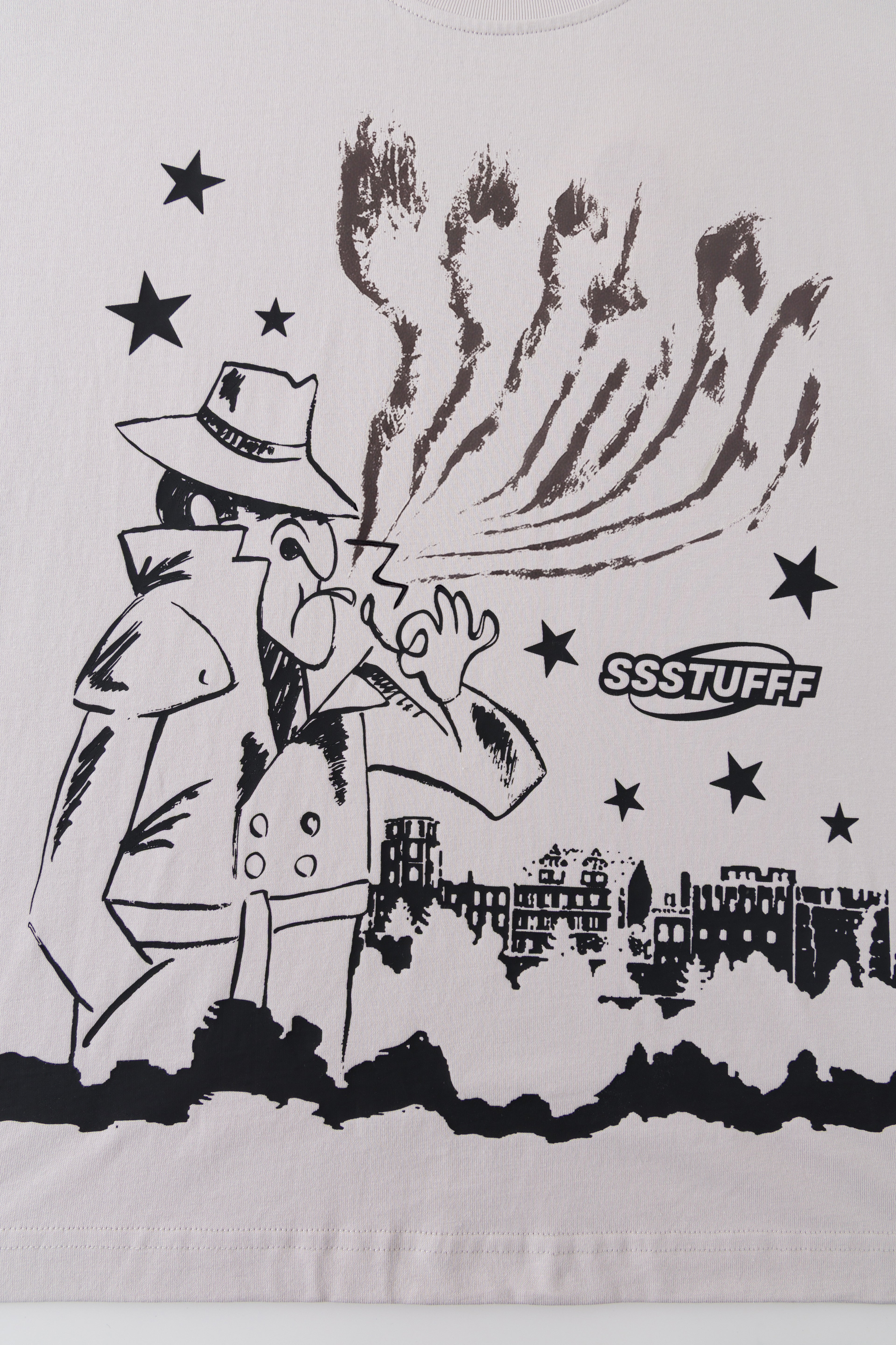 Close-up of the same print with the UV-reactive smoke plume revealed.