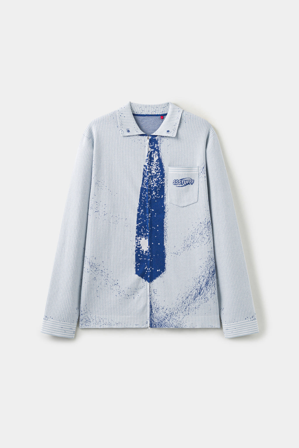 Front view of the pale blue Tie Knit, with the collar, blue necktie and chest pocket knitted as one piece and ink splatter across the body.