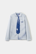 Front view of the pale blue Tie Knit, with the collar, blue necktie and chest pocket knitted as one piece and ink splatter across the body.