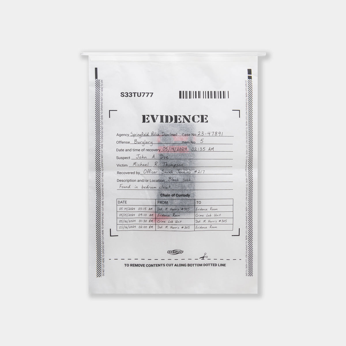 Close-up of the Gunshots Socks EVIDENCE bag packaging with its chain-of-custody form.