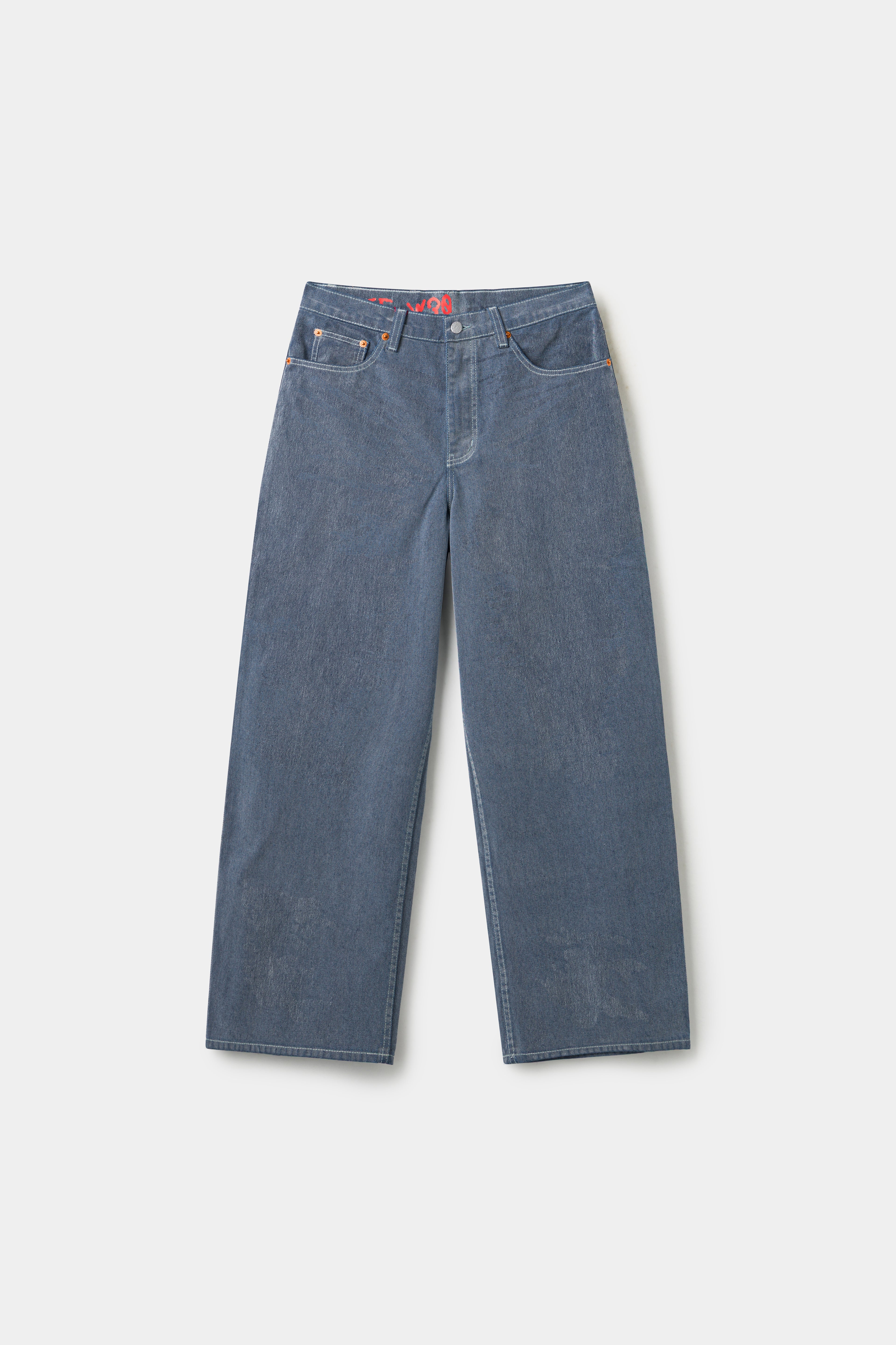 Flock Denim in washed light blue, a flocked wide straight-leg jean with a red SSSTUFFF label at the back waist.
