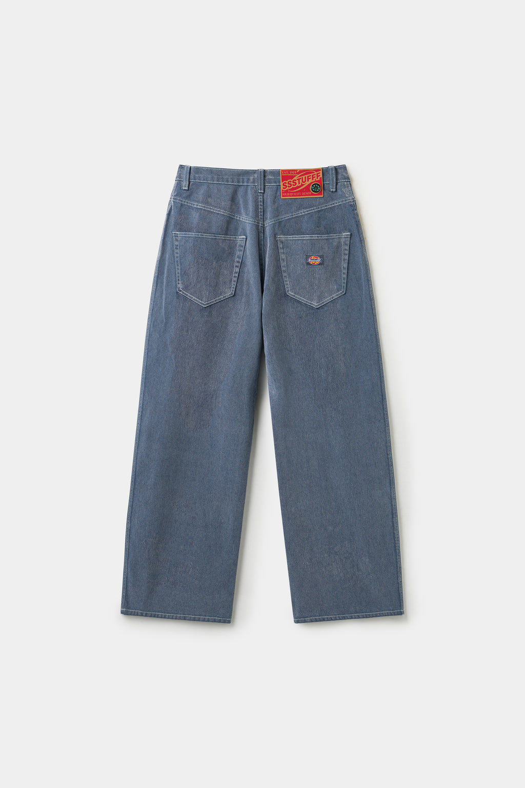 Back view of the Flock Denim, showing the patch pockets and worn-in light and dark pile.