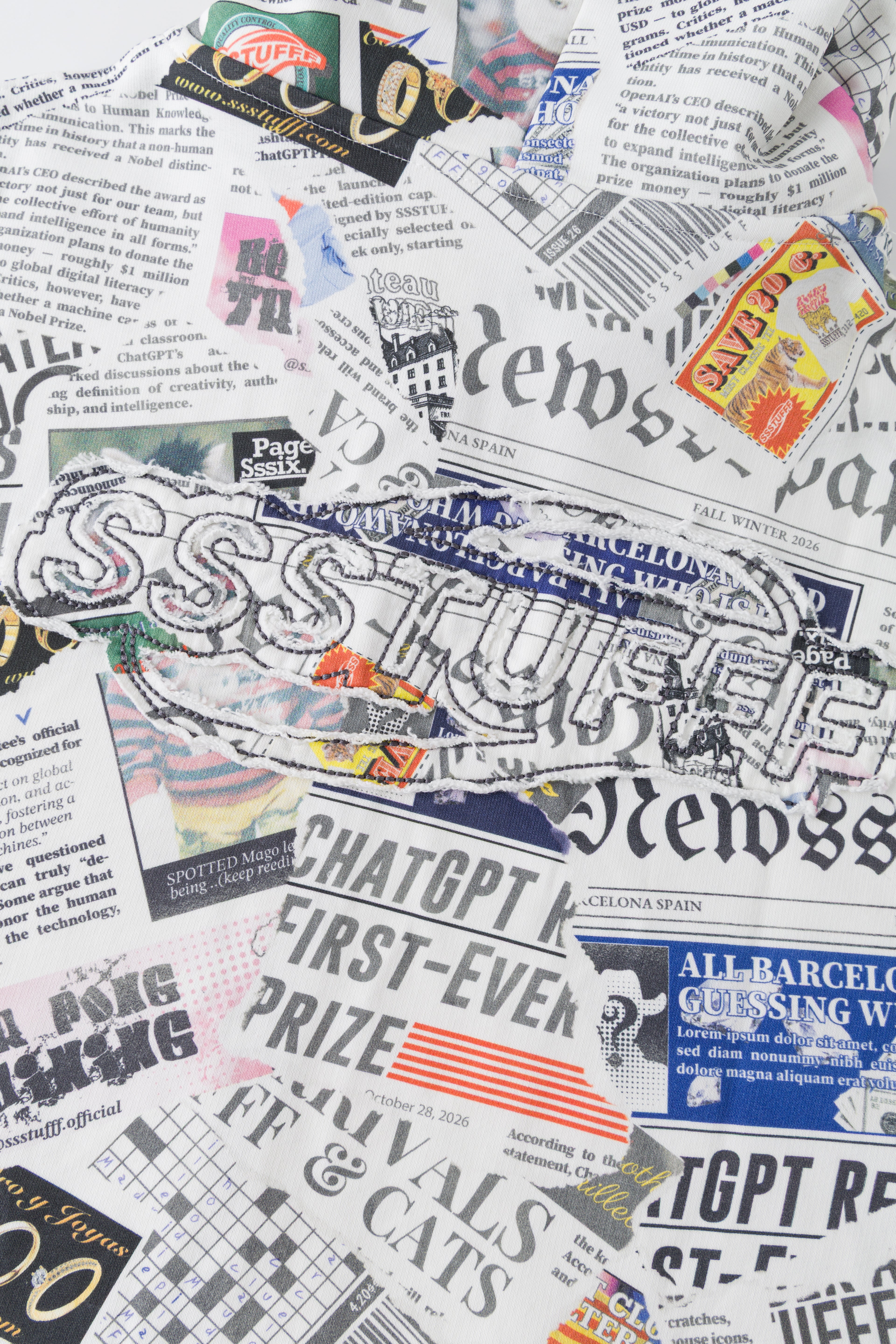 Detail of the all-over newsprint print with the SSSTUFFF headline lettering.