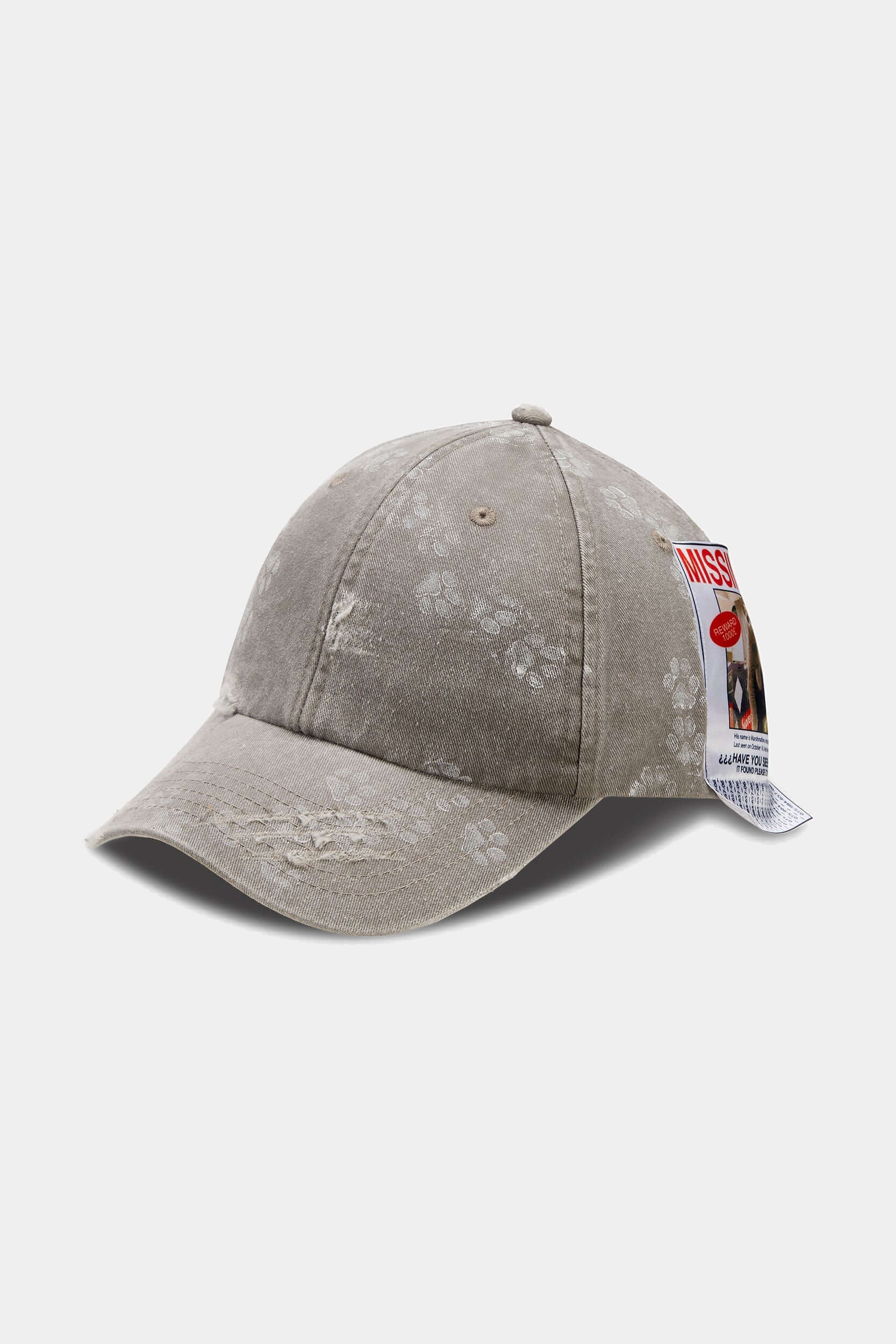 Side view of the light grey Missing Cat Cap, showing the curved brim and washed finish