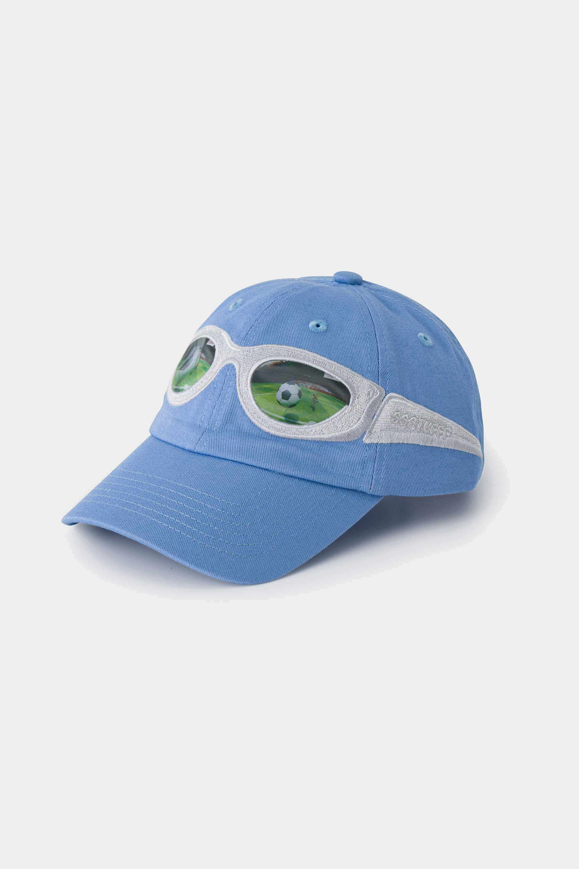 Light blue cotton cap with a grey and green lenticular sunglasses patch across the front panel and brim