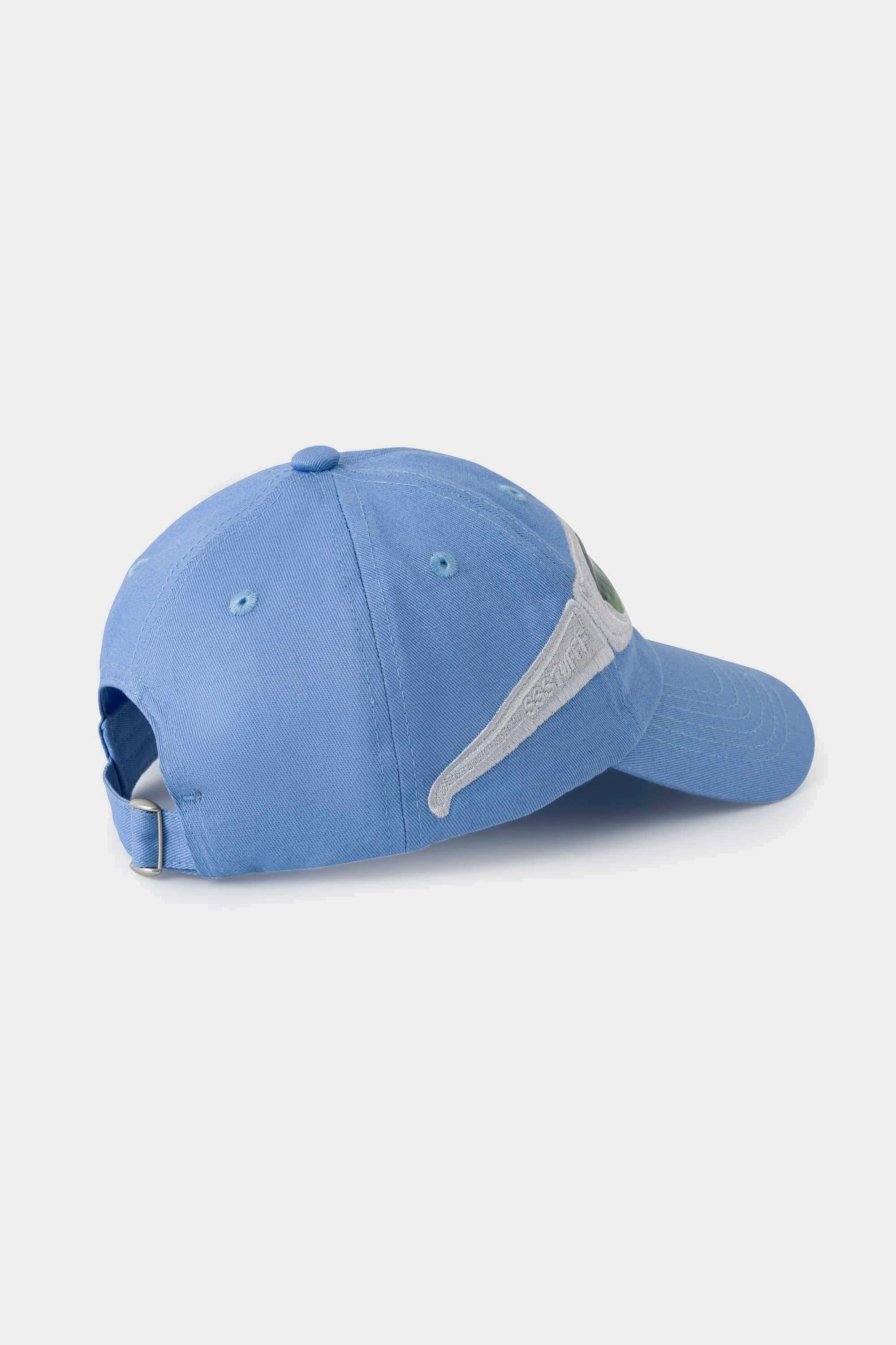 Side view of the light blue Lenticular Sunglasses Cap, the grey glasses patch wrapping onto the brim