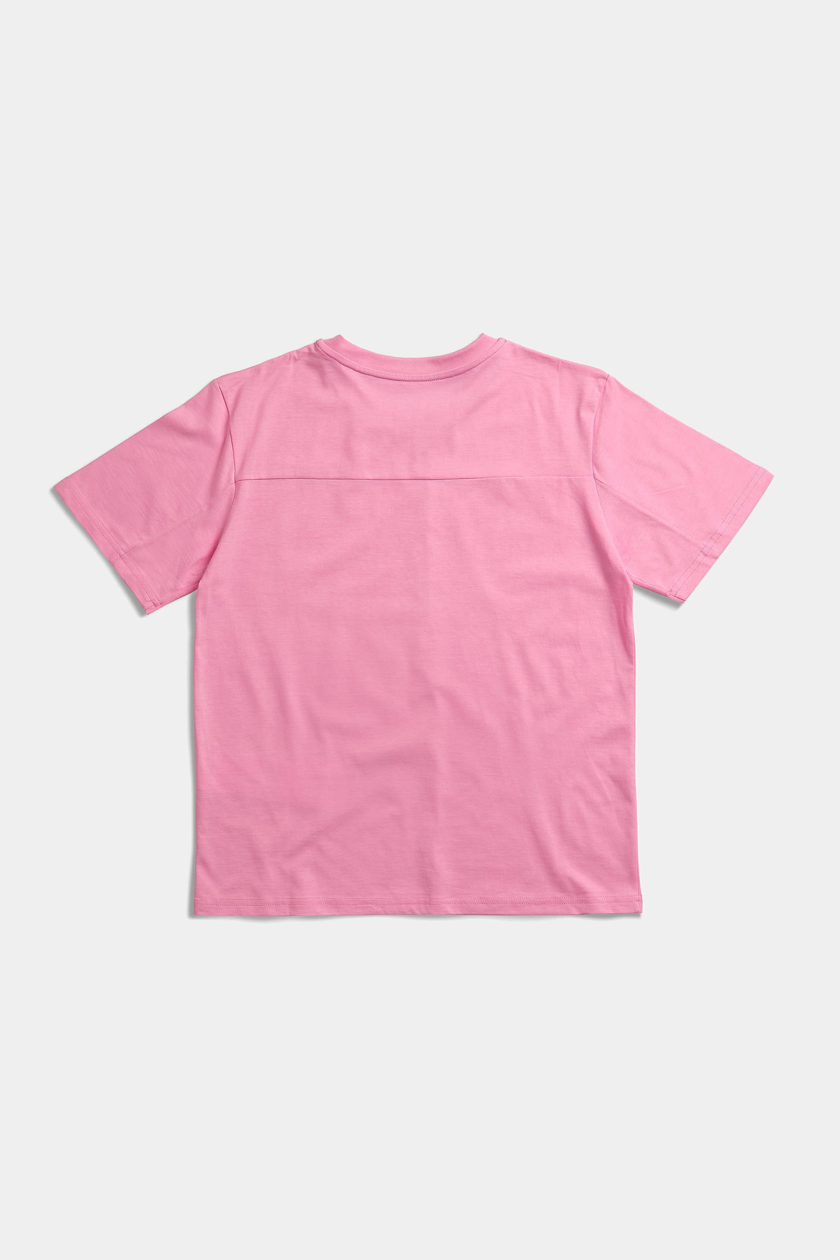 Back of the pink Buttons Shirt Tee laid flat, showing the horizontal yoke seam